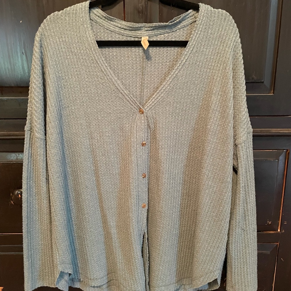 Greenish-blue waffle like sweater